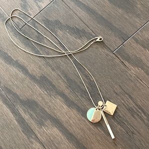 Gold tone pendant necklace gently used